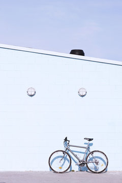 Bike at the wall on a sunny day