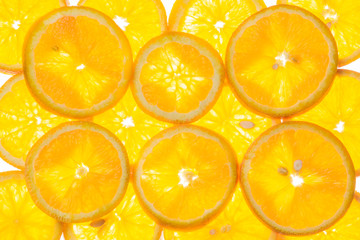 bright orange background of slices of juicy oranges.