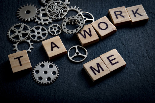 Selfish business employee and no teamwork concept with 2 tiles removed from the word &lsquo;teamwork&rsquo; that make the word &lsquo;me'.They say 'There is no 'I' in 'team'', but it seems to be a 'me' for some people