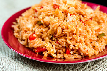 Homemade Chinese fried rice with vegetables and fried eggs