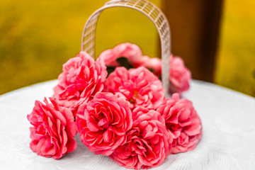 Artificial flowers bouquet on a white table for decoration