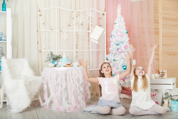 Fototapeta na wymiar Girls in a Christmas decorations