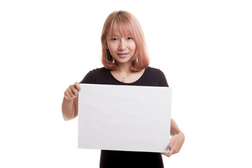 Fototapeta premium Young Asian woman with white blank sign.