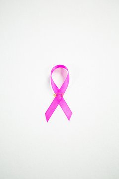 Directly above view of pink Breast Cancer Awareness ribbon with