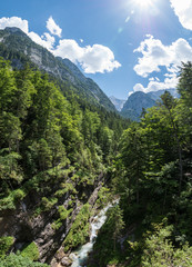 Fototapeta na wymiar The river in mountains of Alps in Tyrol, Bavaria