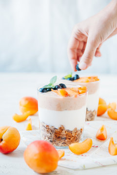 Delicious breakfast with apricots and bluberries