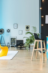 Eclectic loft with bar stool