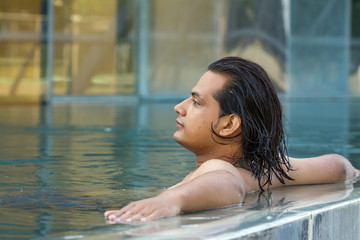 Young man in swimming pool