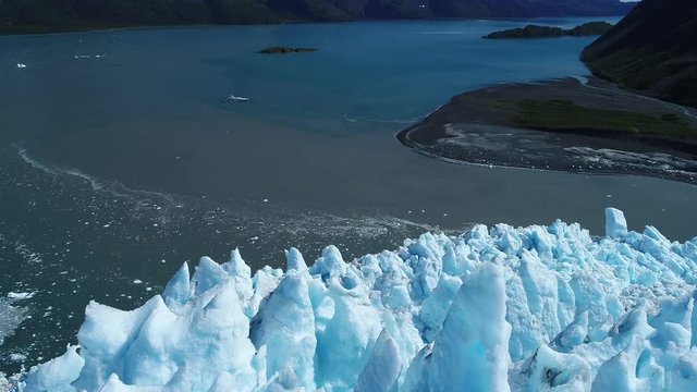 Arial 4k shots of a glacier and it's surroundings in Alaska