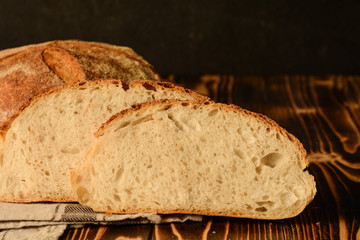 Homemade bread on a wooden background. Style rustic.