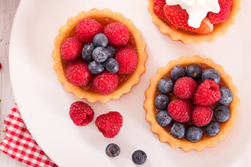 Tartlets with forest fruits. 