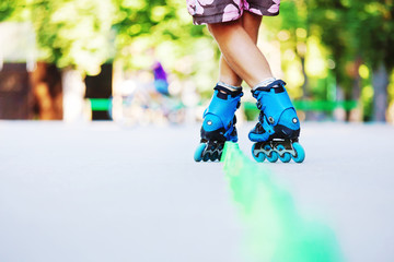 Inline roller skater on a slalom course