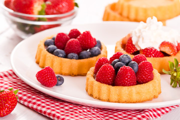 Tartlets with forest fruits. 
