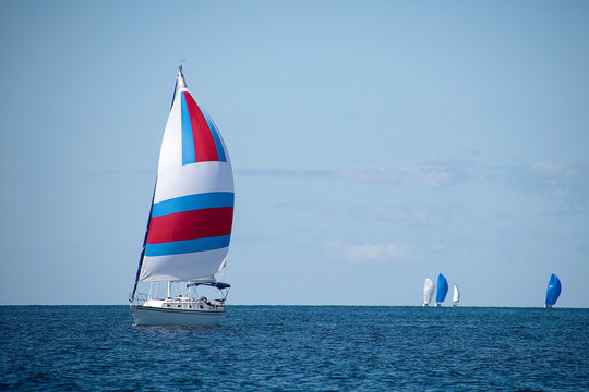 Sail Boat Race On Lake Michigan With Colorful Spinnakers