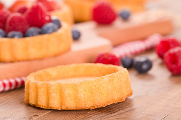 Tartlets with forest fruits. 