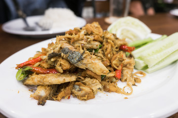 Spicy Mince fish with Chili Paste on white dish,khua kling.Thai food.soft focus