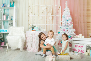 Children in a Christmas decorations