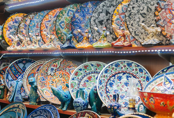 Colorful Turkish dishes. The Grand Bazaar is one of the largest and oldest covered markets in the world. Istanbul, Turkey.