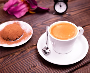 espresso in a white cup with saucer