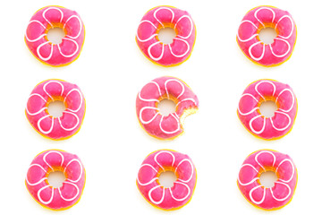 Pattern of strawberry donut .The middle bitten