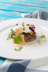 Meat cutlets on a wooden board