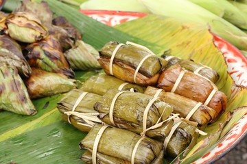 Sticky rice wrapped in banana leaves