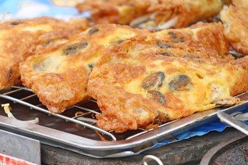 Crispy fried mussels with egg