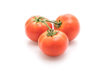 fresh tomatoes on white background