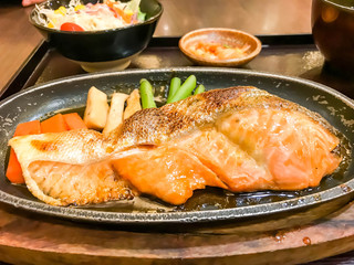 grilled salmon steak with sauce