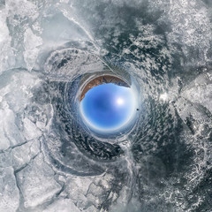 crack on the ice of Lake Baikal from Olkhon. Spherical 360 panorama little planet