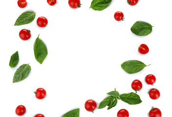 Composition with cherry tomatoes and green fresh organic basil isolated on white