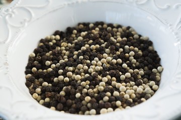 Mix peppercorns in plate