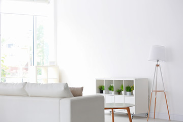 Stand for TV set in modern white living room