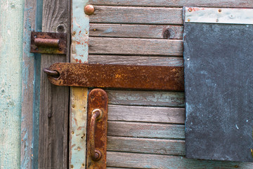 Texture of old wooden plank wall and door.