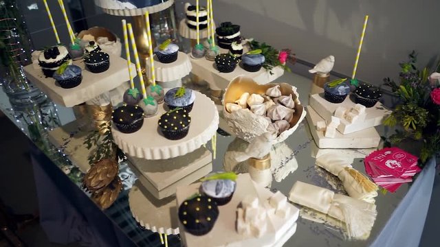 Cute candy bar with various candies and cakes-3