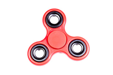 Red fidget spinner isolated on white