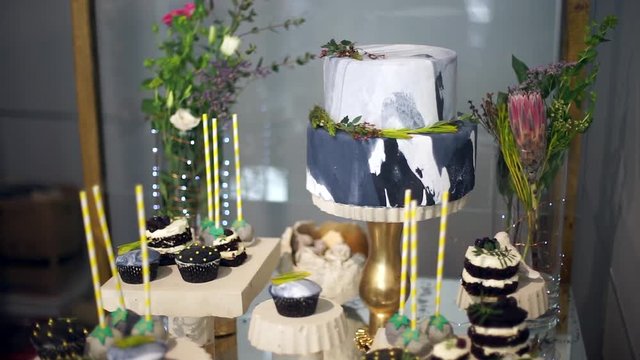 Cute candy bar with various candies and cakes-6