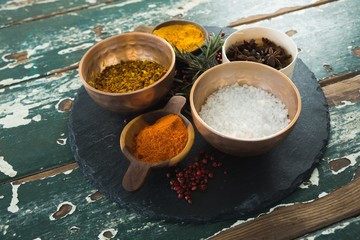 Various spices arranged in board