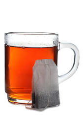 Glass cup with tea on white background