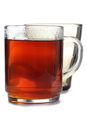 Glass cup with tea on white background