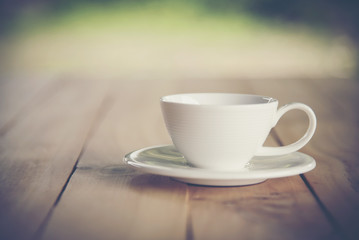 Coffee cup on the table in the morning