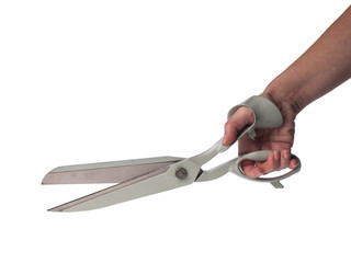 Hand holding pair of scissors on white