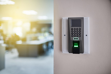 The fingerprint scanner control machine for record work time,fingerprint scanner on wall