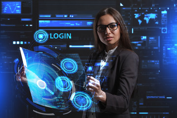 The concept of business, technology, the Internet and the network. A young entrepreneur working on a virtual screen of the future and sees the inscription: Login