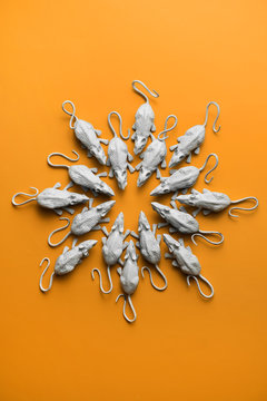 White rats/mouses on orange background.toy/replica