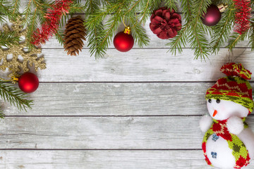 Fototapeta na wymiar Spruce branches with Christmas decorations.