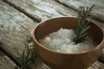 Salt and rosemary herb in bowl