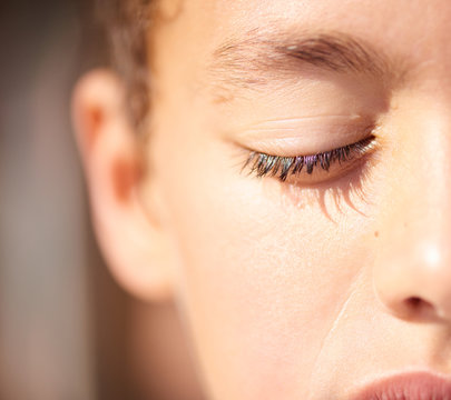 Close-up of kid's half face