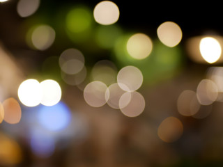 abstract background colorful bokeh light at night, dark tone with copy space