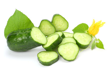 cucumber with sliced cucumber and leaf isolated on white background